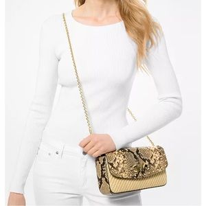 Michael Kors Izzy straw hand clutch or crossbody